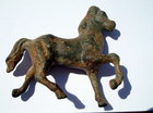 A ROMAN BRONZE FIGURE OF A HORSE