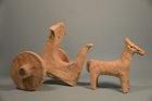 A SYRO-HITTITE TERRACOTTA CHARIOT AND THREE MULES