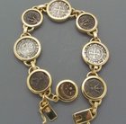THREE CRUSADER COINS AND FOUR WIDOWS  MITES SET IN A 18K GOLD BRACELET