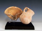 AN ISRAELITE CLAY OIL LAMP AND JUGLET SET