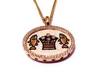 A MICRO MOSAIC OF LOAVES AND FISHES IN 18K GOLD AND DIAMOND PENDANT