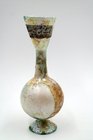 A BYZANTINE FOOTED FLASK