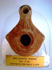 A HELLENISTIC TERRACOTTA OIL LAMP