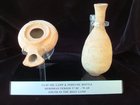 A HERODIAN TERRACOTTA OIL LAMP AND ALABASTRON