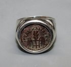 A BRONZE PRUTAH OF PONTIUS PILATE WITH SIMPULUM IN SILVER RING