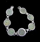SEVEN BRONZE COINS OF THE FIRST JEWISH REVOLT IN SILVER BRACELET