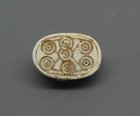 A CANAANITE STEATITE SCARAB WITH CONCENTRIC CIRCLE MOTIF
