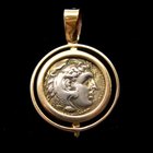 A SILVER DRACHM OF ALEXANDER THE GREAT IN 14K GOLD