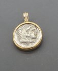 A SILVER TETRADRACHM OF ALEXANDER THE GREAT SET IN 18K GOLD PENDANT
