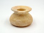 A CANAANITE ALABASTER OINTMENT JAR